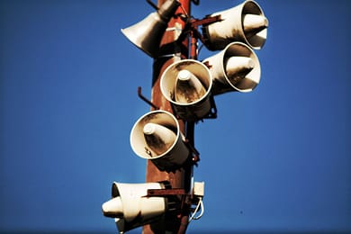 pexels-photo-776153 megaphone speakers on wooden post